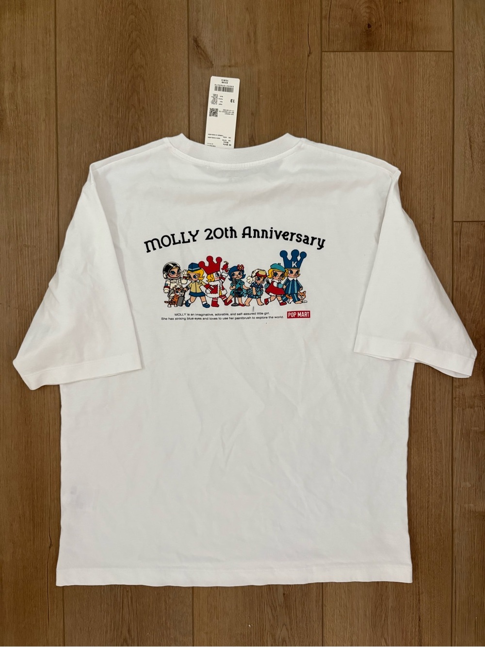 Uniqlo White Kids Tee with Small Colorful Character Print - Picture 3 of 3